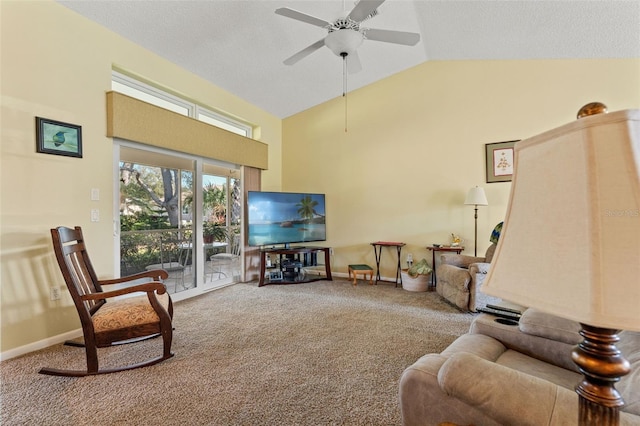 carpeted living room with a textured ceiling, high vaulted ceiling, and ceiling fan