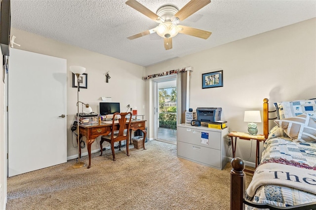 bedroom featuring ceiling fan, light colored carpet, a textured ceiling, and access to outside