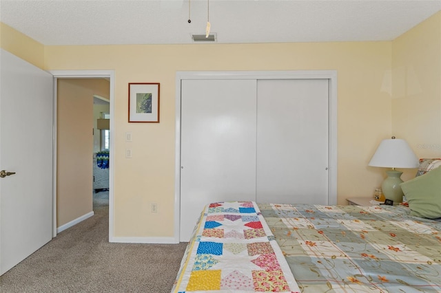 unfurnished bedroom featuring carpet floors and a closet