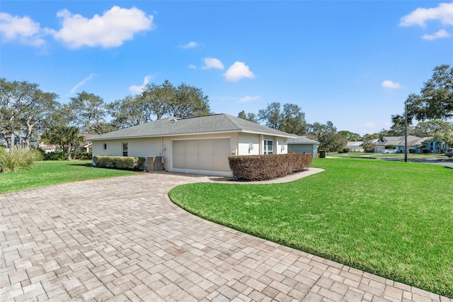 view of property exterior featuring a garage and a yard