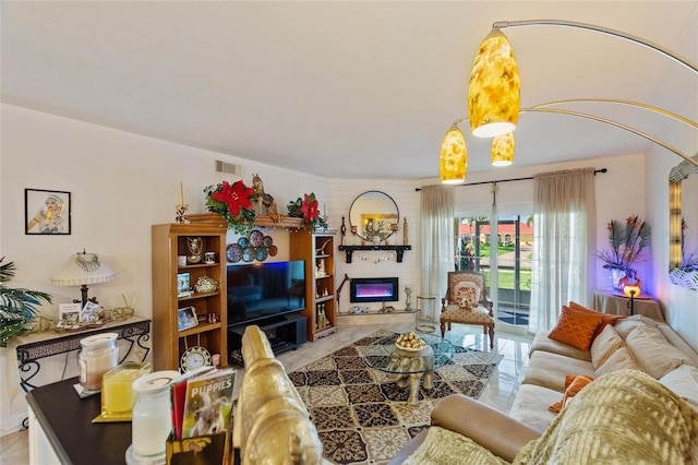 living room with a large fireplace