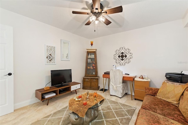 living room featuring ceiling fan