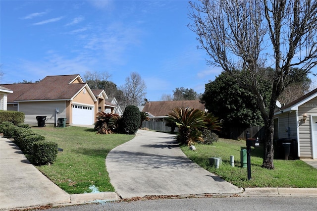 view of front facade featuring a front yard and a garage