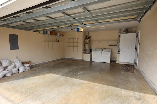 garage with washer and dryer, electric panel, a garage door opener, and gas water heater