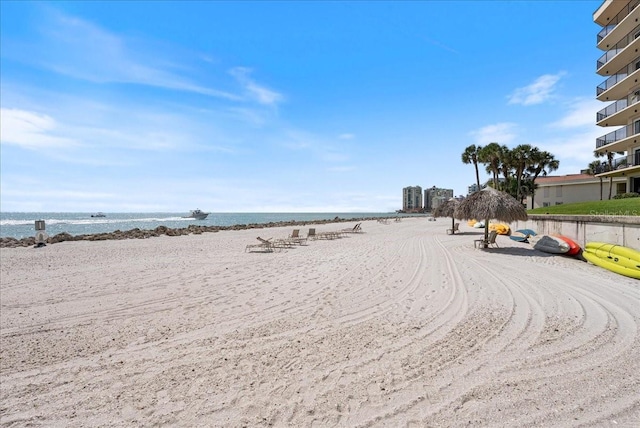 property view of water featuring a beach view