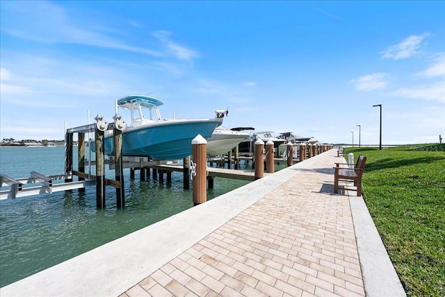 view of dock featuring a water view and boat lift