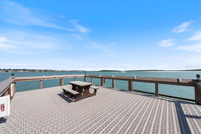 dock area featuring a water view