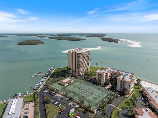 aerial view featuring a water view and a city view