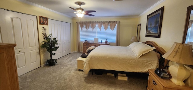 bedroom with ornamental molding, light colored carpet, and ceiling fan