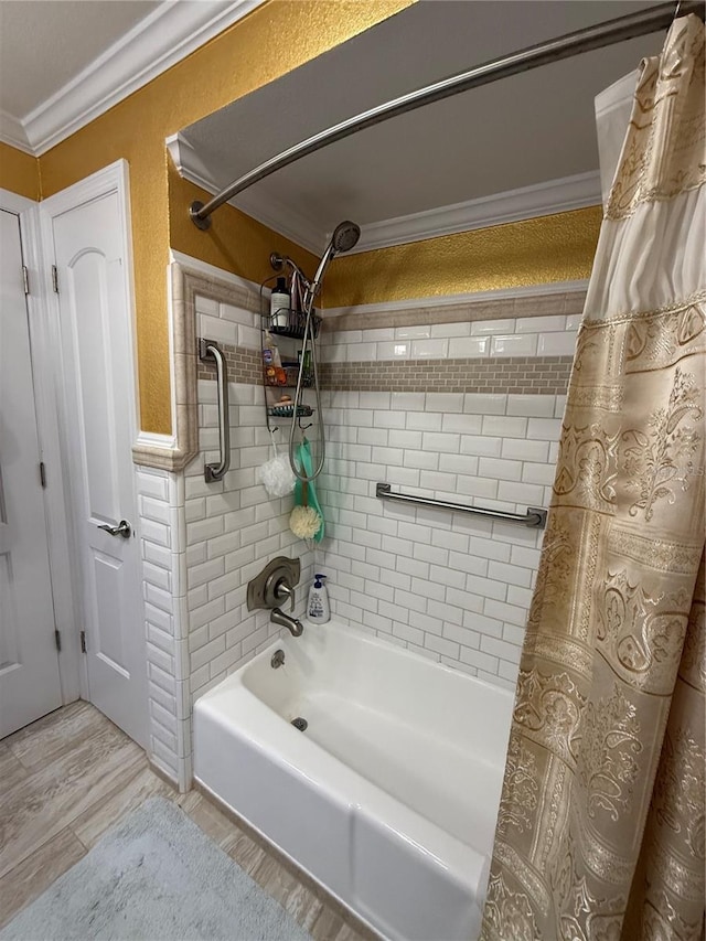 full bathroom with wainscoting, wood finished floors, ornamental molding, and shower / tub combo with curtain