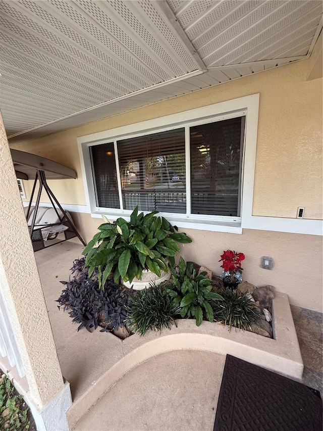exterior space with stucco siding