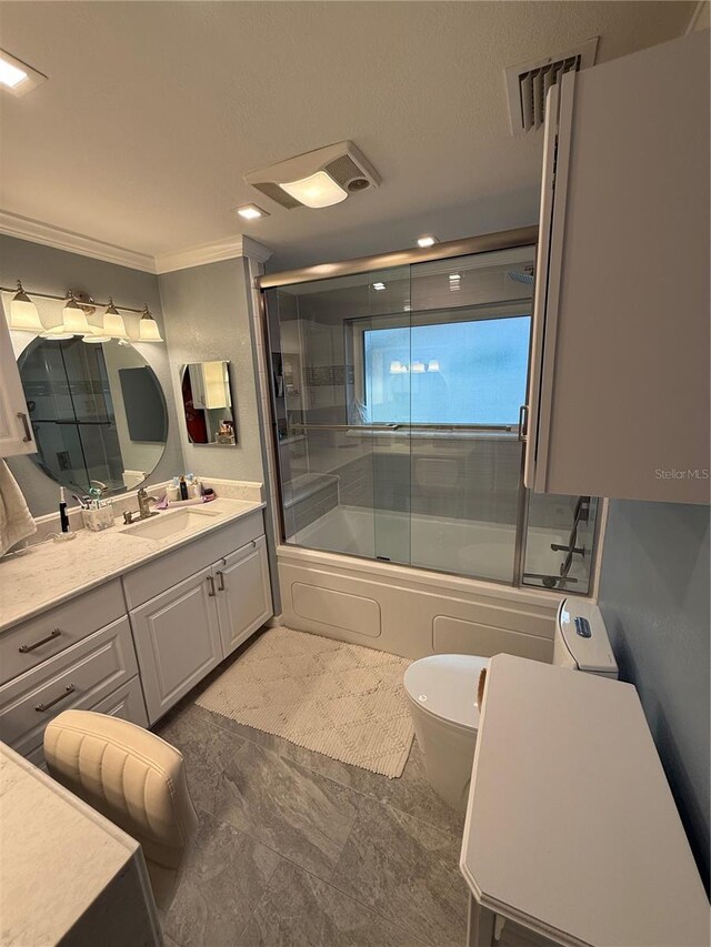 full bathroom featuring enclosed tub / shower combo, crown molding, vanity, and visible vents