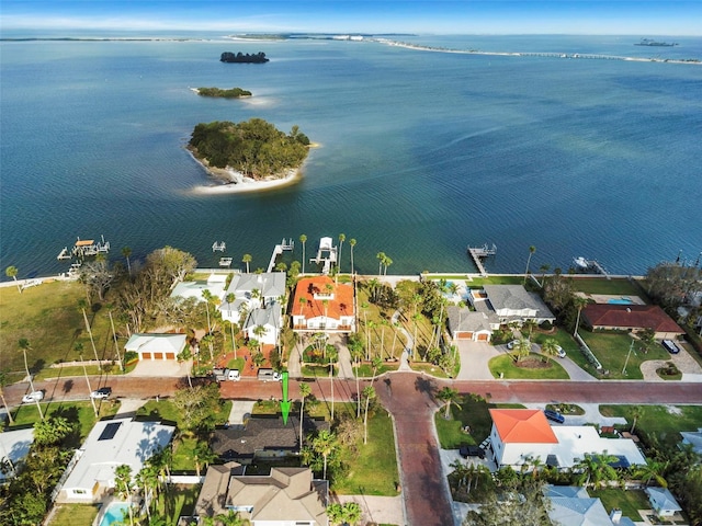 aerial view with a residential view and a water view