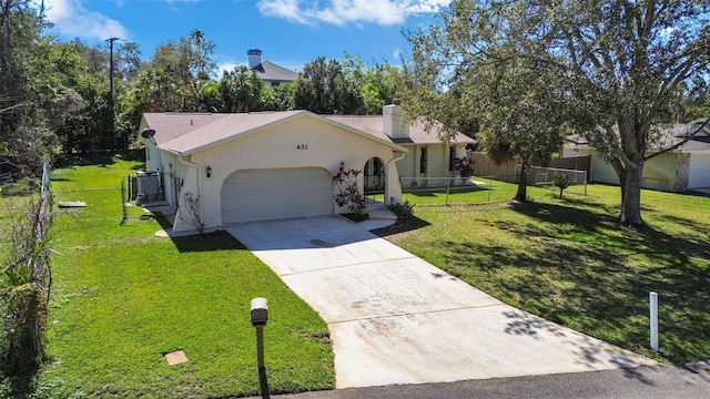 ranch-style house with a garage and a front yard