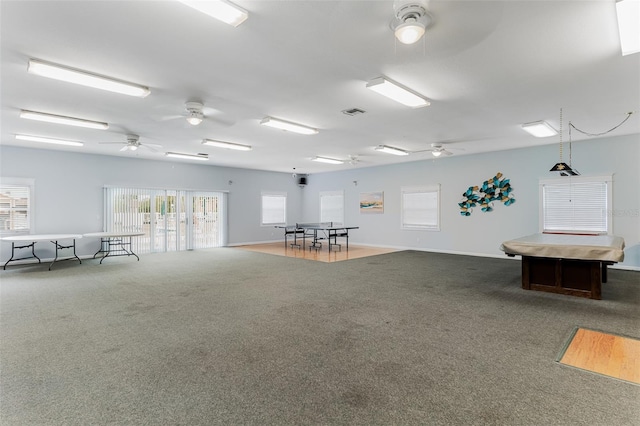 miscellaneous room featuring carpet flooring