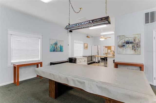 playroom with carpet floors, baseboards, visible vents, and ceiling fan