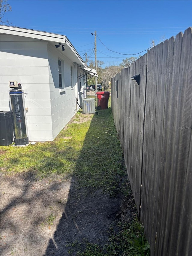 view of yard featuring central AC unit