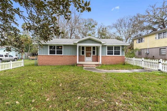 view of front of home with a front yard