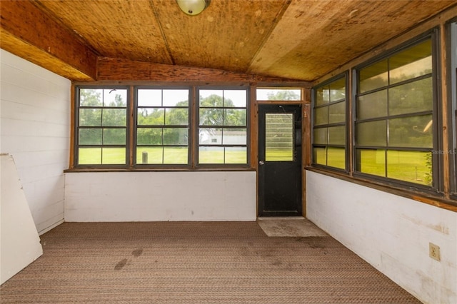 unfurnished sunroom with lofted ceiling and wood ceiling