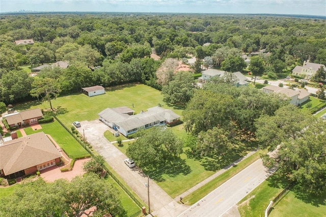 bird's eye view with a forest view and a residential view