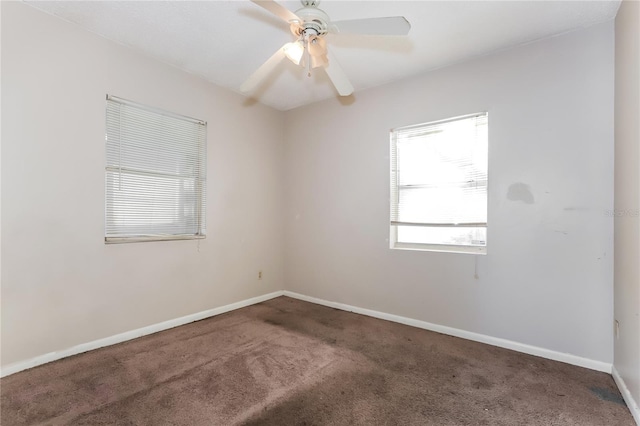 carpeted empty room with ceiling fan