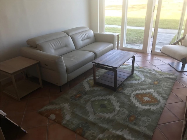 living room with tile patterned flooring