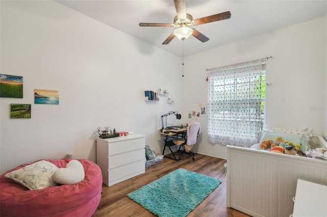 bedroom featuring ceiling fan and wood finished floors