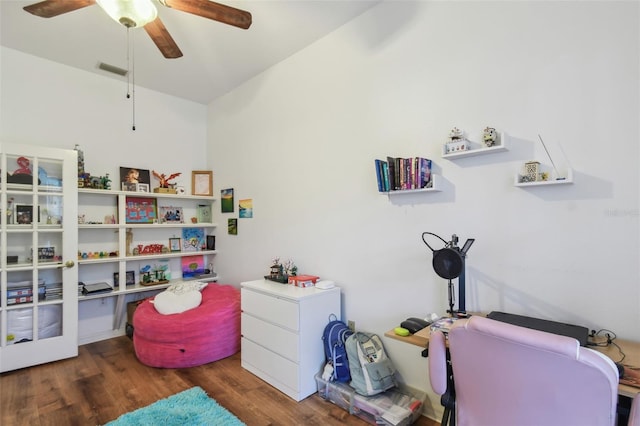 game room with visible vents, ceiling fan, and wood finished floors