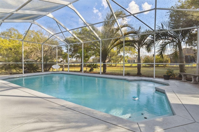 pool featuring a lanai and a patio area