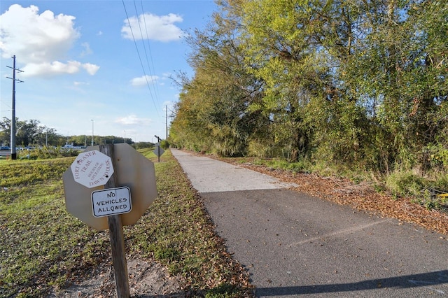 view of road featuring traffic signs