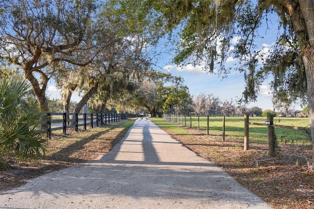 surrounding community featuring fence