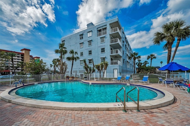 view of pool featuring a patio area