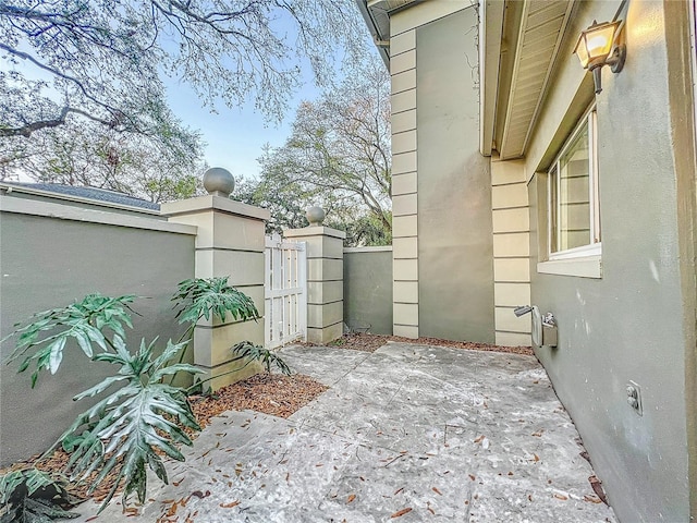 view of patio / terrace featuring fence