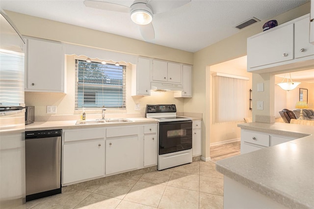 kitchen featuring a sink, white range with electric stovetop, white cabinets, and stainless steel dishwasher