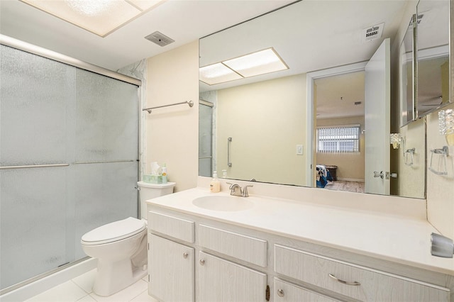 full bathroom with tile patterned flooring, toilet, visible vents, vanity, and a shower stall