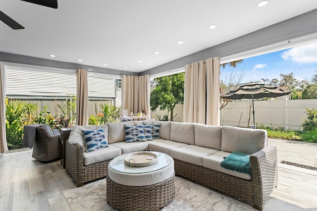 living room with light hardwood / wood-style floors