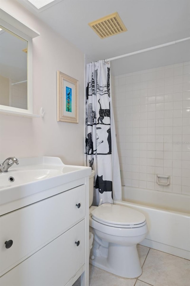 full bath with toilet, vanity, visible vents, tile patterned floors, and shower / bath combination with curtain