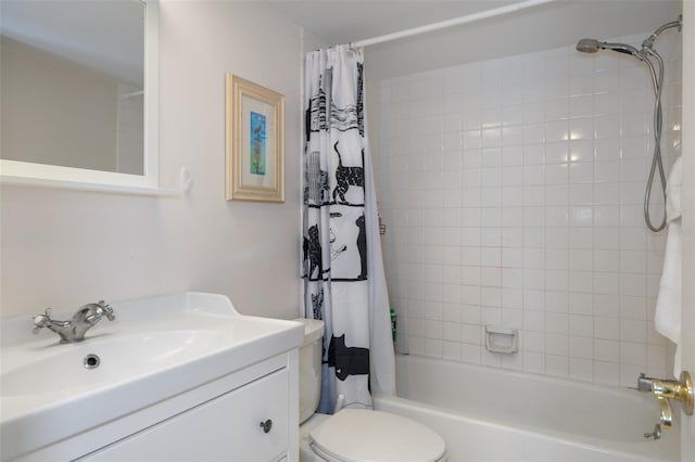 bathroom with vanity, shower / bath combination with curtain, and toilet