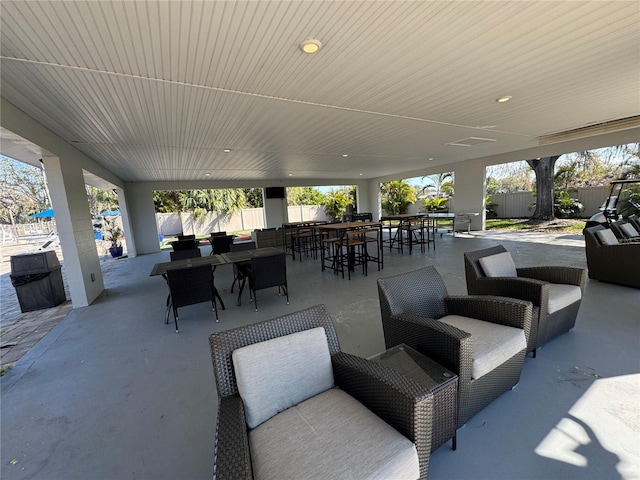 128 Nancy Dr Unit 128, Oldsmar, FL 34677 - view of patio / terrace featuring outdoor dining space