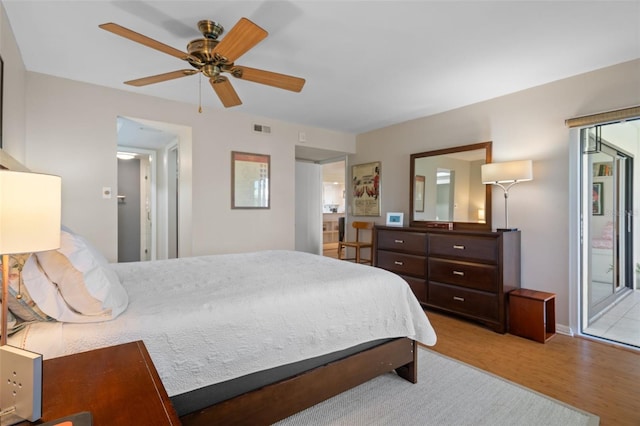 128 Nancy Dr Unit 128, Oldsmar, FL 34677 - bedroom featuring wood finished floors, baseboards, and ceiling fan