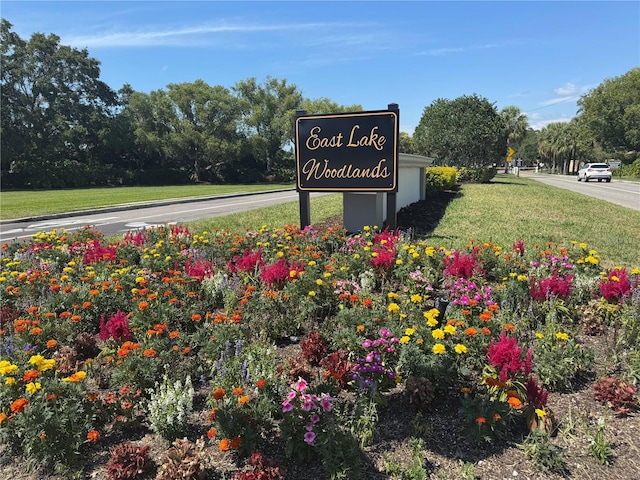 128 Nancy Dr Unit 128, Oldsmar, FL 34677 - community / neighborhood sign featuring a yard