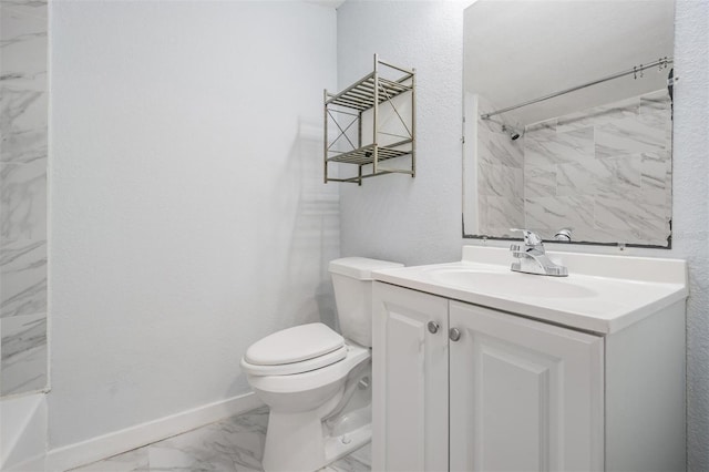 bathroom featuring baseboards, toilet, vanity, marble finish floor, and shower / bathtub combination