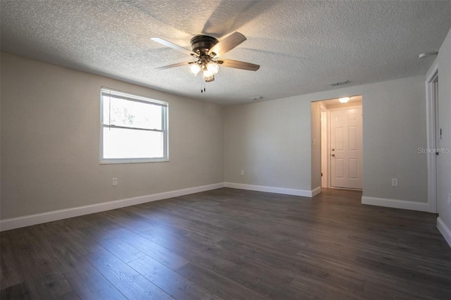 unfurnished room with ceiling fan, dark hardwood / wood-style floors, and a textured ceiling