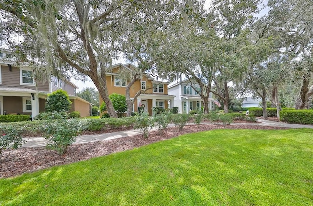 view of front of home featuring a front yard