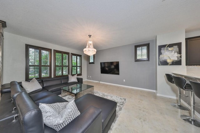 living room with a textured ceiling