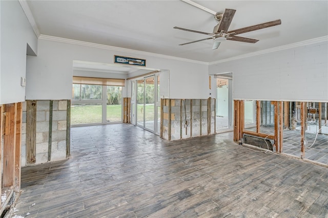 unfurnished room featuring hardwood / wood-style flooring, ceiling fan, and ornamental molding