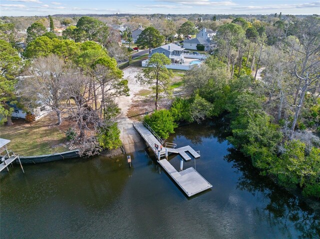 45 Gulfwinds Dr W, Palm Harbor, FL 34683 - aerial view of property and surrounding area featuring a large body of water and a tree filled landscape