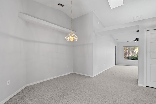 45 Gulfwinds Dr W, Palm Harbor, FL 34683 - carpeted empty room with vaulted ceiling, baseboards, a chandelier, and ceiling fan