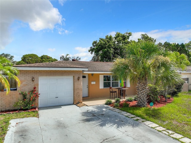 single story home featuring a garage