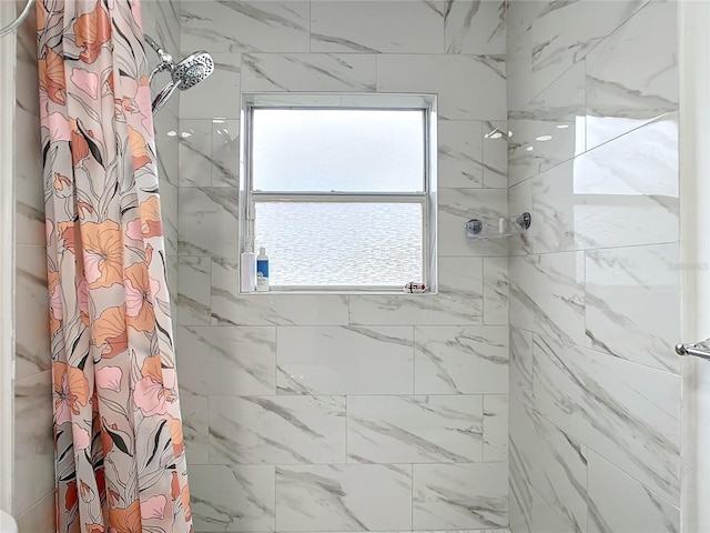 bathroom featuring a shower with curtain